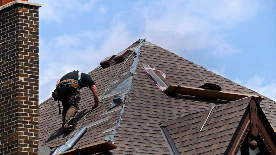 storm damaged roof in Fort Myers